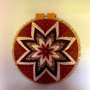 Vintage quilt wreath with wooden edge. Great for country home.